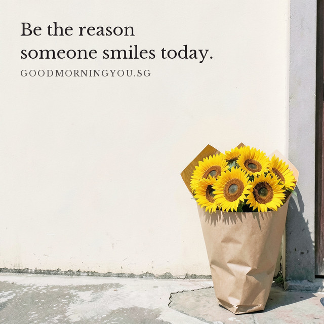 A bunch of sunflowers in kraft paper by a doorway. Be the reason someone smiles today.