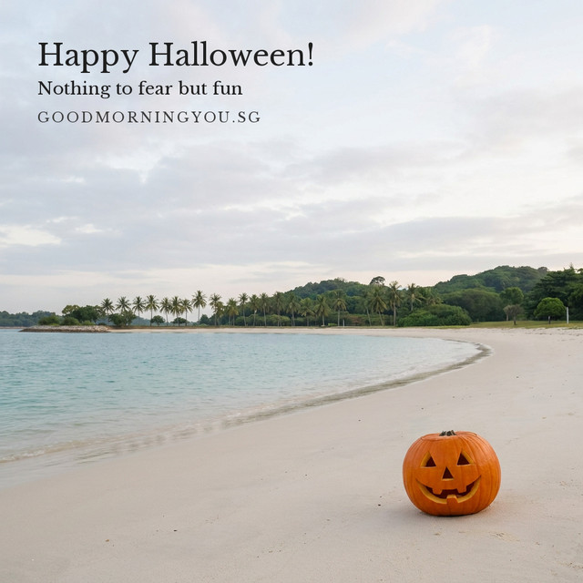 A carved jack-o'-lantern on a white sand beach curving along a calm turquoise lagoon lined with palms, and the words "Happy Halloween! Nothing to fear but fun"