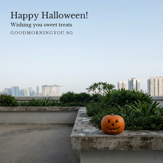 A carved jack-o'-lantern on a ledge in a rooftop garden with the city skyline beyond, and the words "Happy Halloween! Wishing you sweet treats"